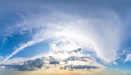 Vast Blue Sky with Wispy White Clouds and Sunbeams Creating a Beautiful Panoramic Vibe During Daytime, Perfect for Backgrounds