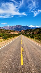 Naklejka premium Scenic highway stretching into mountains