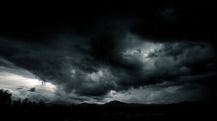 Obraz premium rain strom cloudy darkness frightening sky in rainy season black dark color tone.