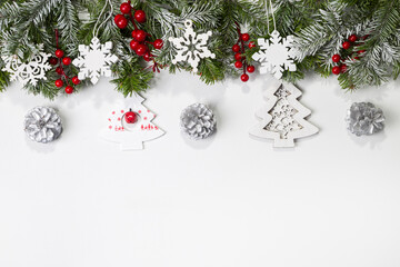 Christmas card with fir branches and Christmas decorations