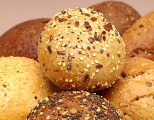 Close-up of assorted seed-topped bread rolls