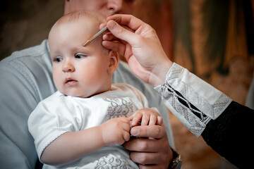 baptism of a baby in a church, the process of baptism of a child in a church, the Orthodox Church