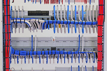 The reverse side of the electrical panel. Under copper insulated electrical wires to modules...