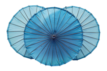 Two light blue parasols overlapping, showcasing intricate details and traditional design. background removed