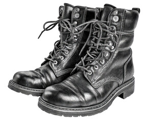 Close-up of a pair of black leather work boots.  Laces, eyelets, and sturdy soles are visible.  High-top style