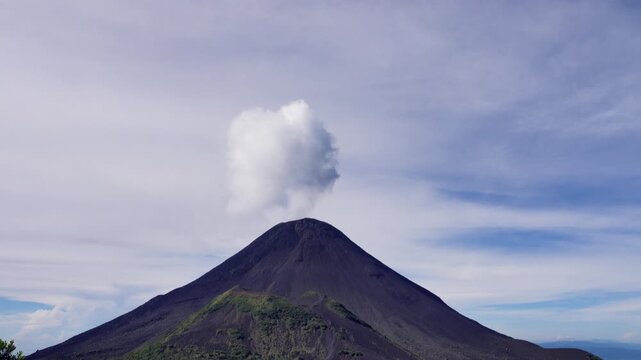 The Soputan volcano spewed volcanic gas and vapor from the vent, convulsion of nature; eructation