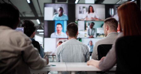 Professional Team Conducting Virtual Business Video Conference