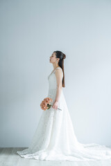 Fototapeta premium ウェディングドレスを着た女性