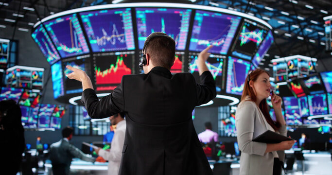 Stressed Broker Analyzing Stock Market Crash - Powered by Adobe