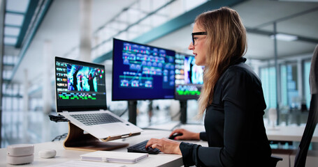 Creative Woman Editing Videos Using Digital Design Software