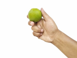 Man hand holding a Fresh green lime isolated on white background 