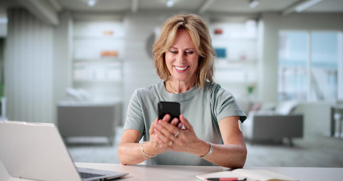 Senior Woman Using Digital Continuous Glucose Monitor