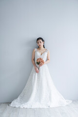 Fototapeta premium ウェディングドレスを着た女性