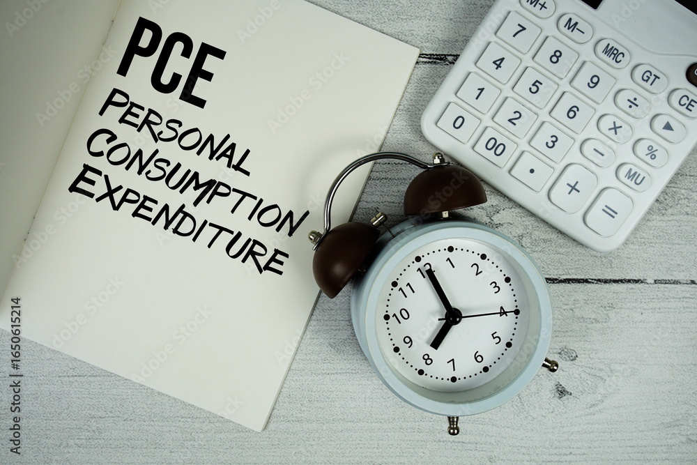 Poster pce personal consumption expenditure text on paper notebook page with alarm clock and calculator on 