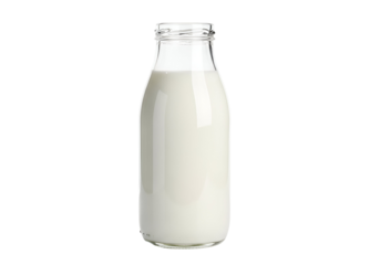 Close-up of a glass milk jar filled with fresh milk against a black background