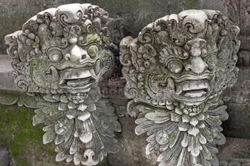 Balinese Ancient Stone Statues and Mythological Sculptures. Traditional Carvings of Frogs, Dragons,...