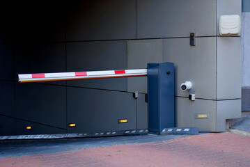 Modern Underground Parking Entrance with Automated Barrier System
