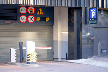 Modern Underground Parking Entrance with Automated Barrier System