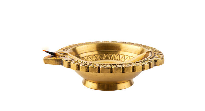 Golden oil lamp burns, casting soft light for ritual branding.