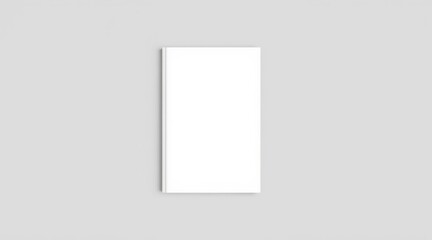 Blank Book Mockup: A pristine, vertically-oriented book stands against a clean, simple backdrop, inviting viewers to envision the untold story within its crisp, blank pages.
