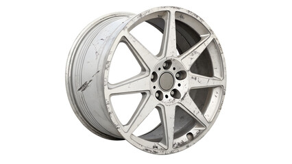 A damaged and worn alloy car wheel rim with scratches, isolated on transparent background