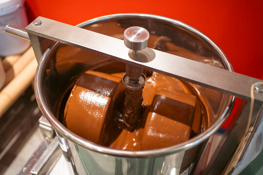 Chocolate mixing container in conching machine for smooth production, Stainless steel vessel blending cocoa in chocolate manufacturing process