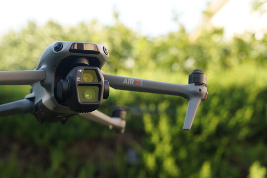 The new Drone DJi Air 3s, close up view camera detail. horizontal