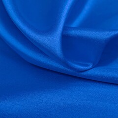 Smooth, vibrant blue satin fabric