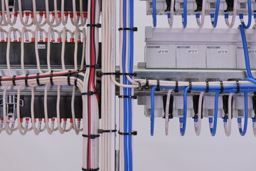 The reverse side of the electrical panel. Under copper insulated electrical wires to modules...
