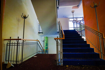 stairwell in an abandoned hotel