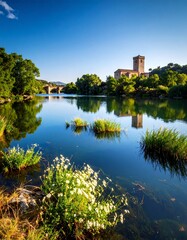 Fototapeta premium Scenic river landscape with bridge and church