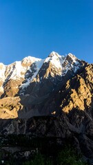 Snow-capped mountains at dawn