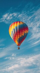Fototapeta premium Colorful hot air balloon against a vibrant sky