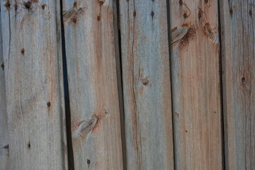 Old wood with a beautiful pattern, wooden boards with old rusty metal nails, dried out wood,...