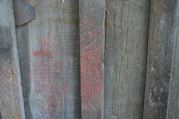 Old wood with a beautiful pattern, wooden boards with old rusty metal nails, dried out wood,...
