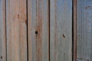 Old wood with a beautiful pattern, wooden boards with old rusty metal nails, dried out wood,...