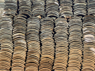 Stacked Curved Tiles Forming a Textured Pattern