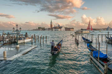 San Giorgio Maggiore church and traditional Venetian gondolas in Venice, Italy