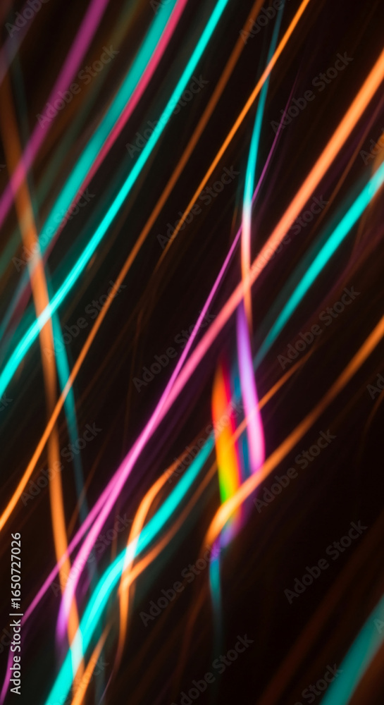 Poster abstract image of colorful light streaks on black background, creating dynamic and energetic visual 