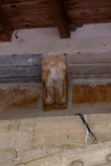 Eroded corbel above Romanesque arch in San Nicolas de Bari Church Sotillo de Boedo Palencia © Agustin