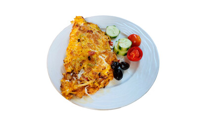 Isolated mushroom omelet served with tomatoes, olives and cucumber on a plate