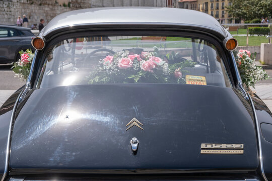 Valladolid, Valladolid, Spain - May 17, 2025: Wedding car at the door of the church of Santa Maria de la Antigua, black vintage citroen ds popularly known as "Shark"