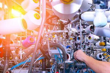 Advanced textile production process in a modern facility during daylight hours