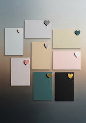 Arrangement of colorful square and rectangular notepads with heart shaped magnets