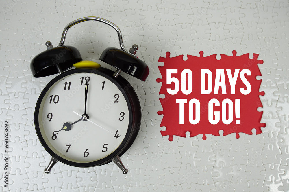 Poster 50 days to go! text with alarm clock on red background
