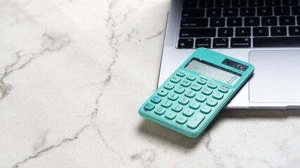 calculator and notebook isolated white background