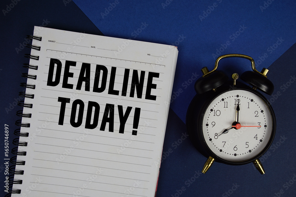 Poster deadline today! text written on notepad with alarm clock on navy blue background