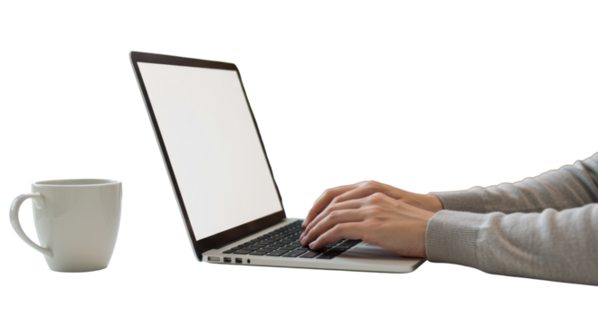 Person's hands typing on sleek laptop, blank screen. Blurred wood wall, green plants, coffee mug foreground. Soft natural light. Concept of modern remote work
