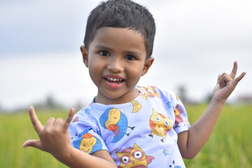 3 year old Asian child with happy expression