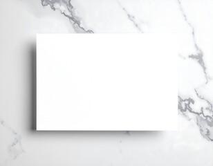 Blank white paper on marble background